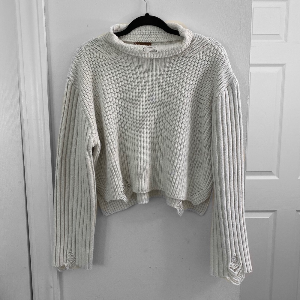 UO MOCK NECK DISTRESSED SWEATER